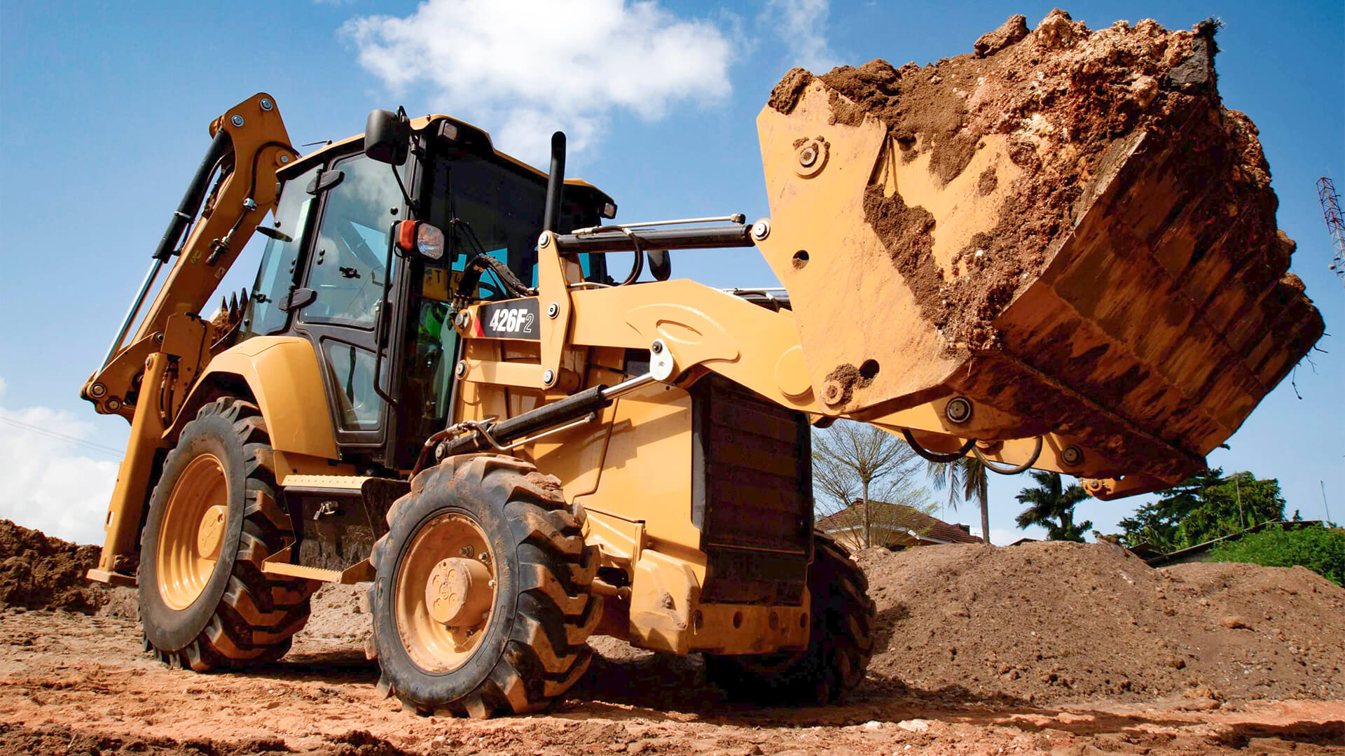 Cat 426 ® — вид сбоку