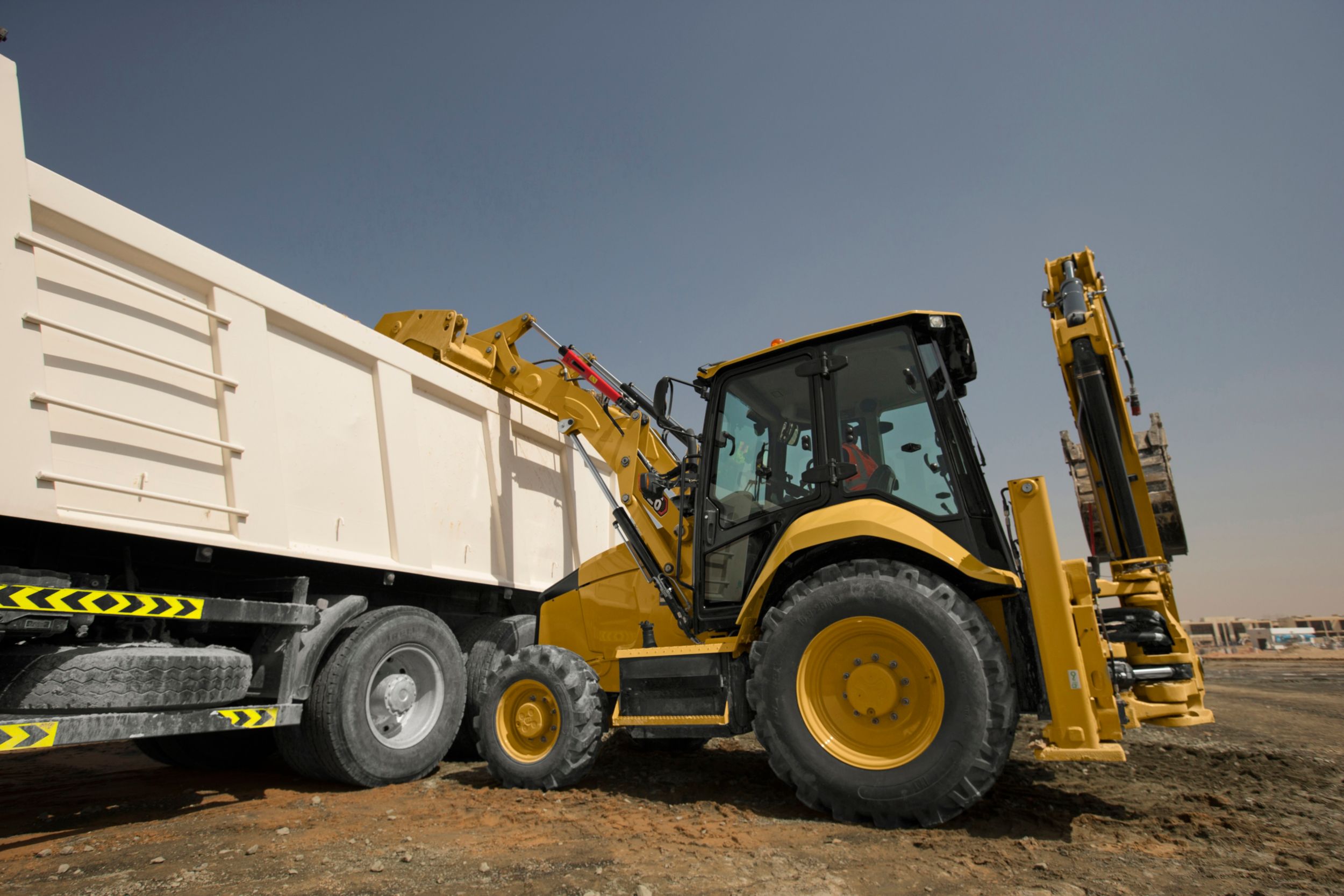 Стрела Cat 426 ® в работе