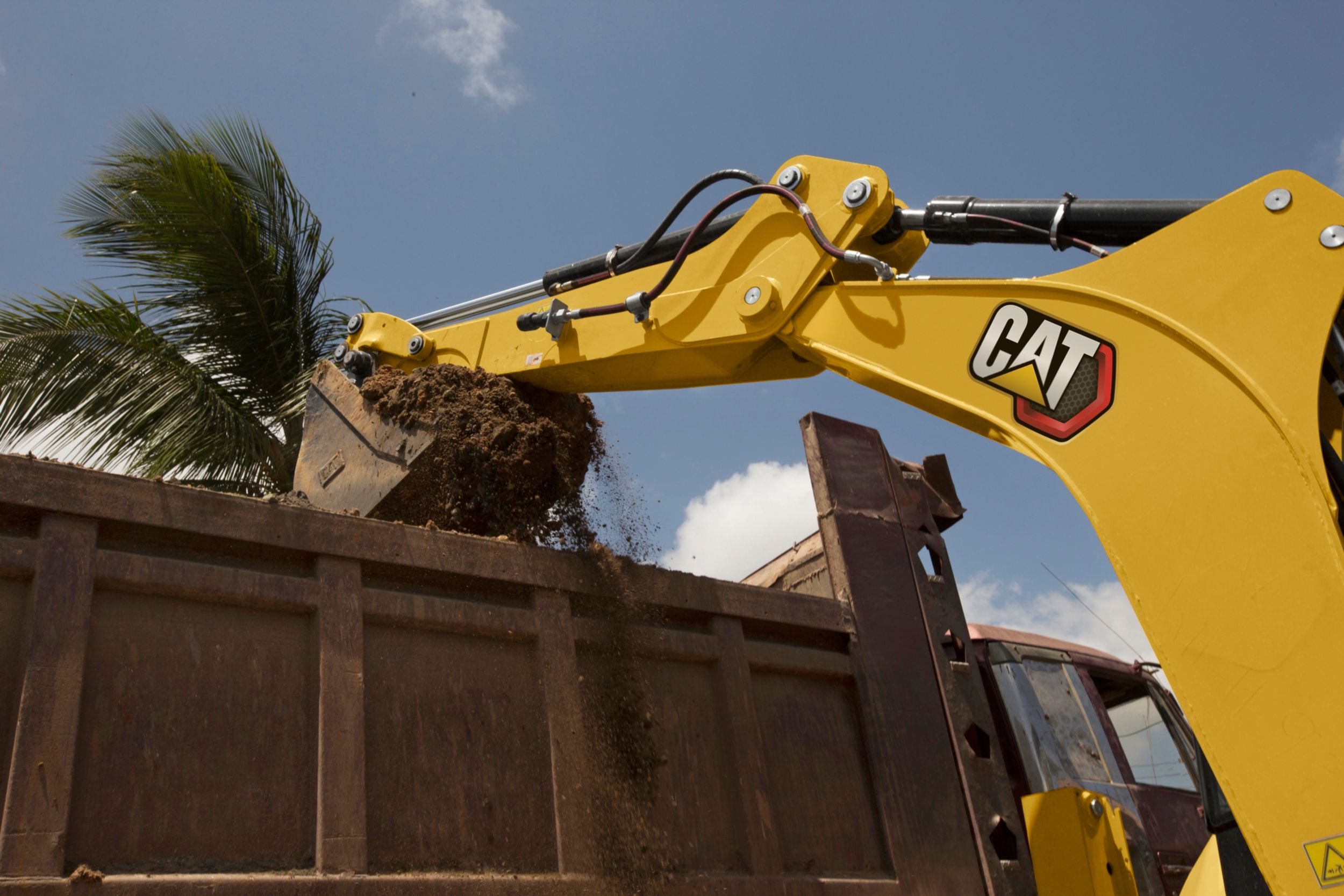 Стрела Cat 426 ® в работе